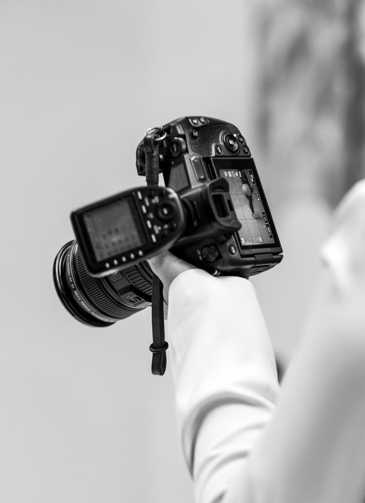 Close-up of Victoria's camera mid-shoot, black and white