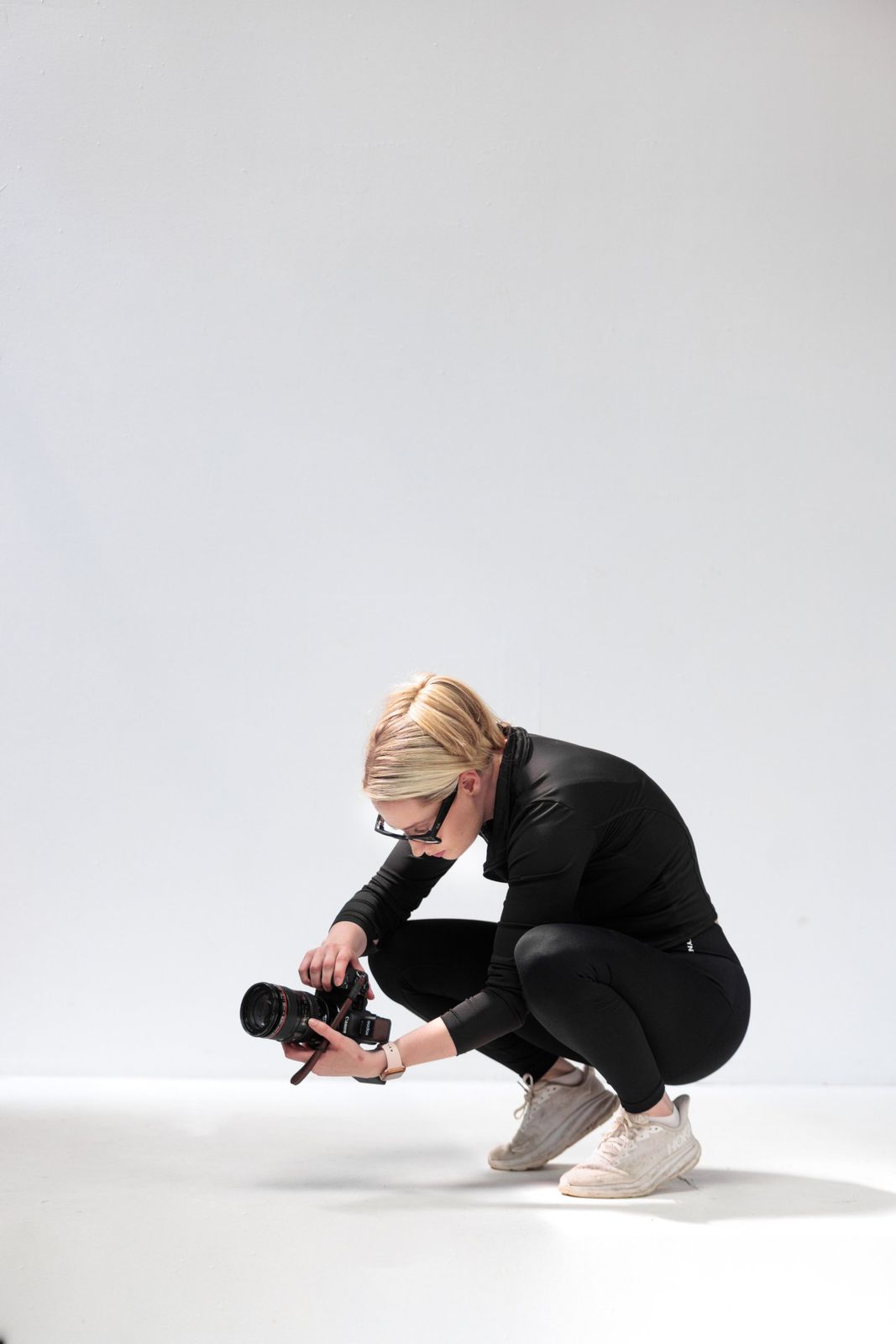 Victoria crouching low to get the shot